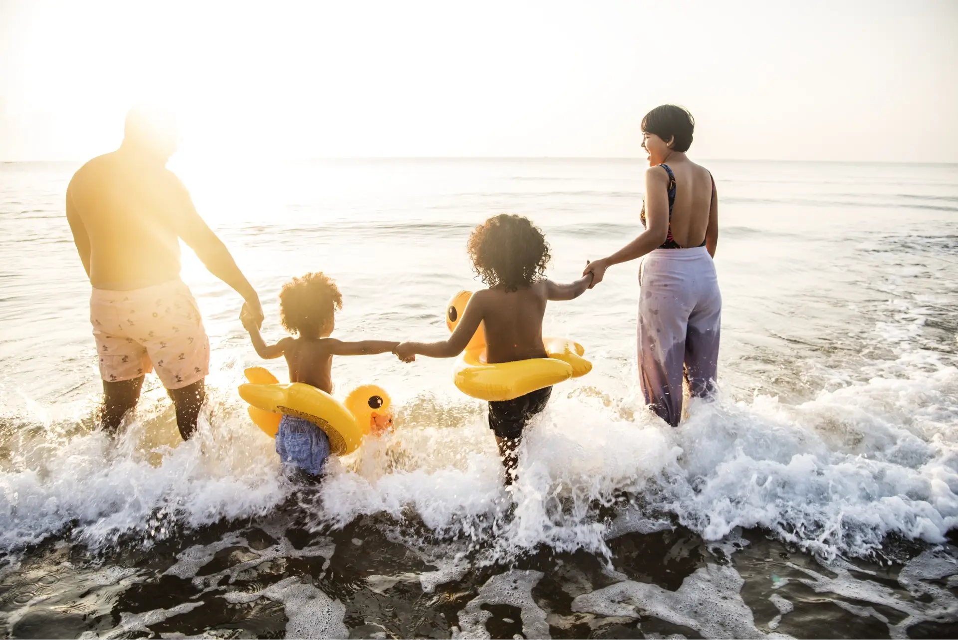2026/03/black-family-having-fun-beach.webp